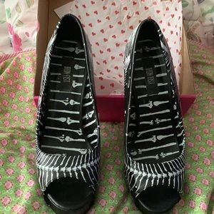 Iron fist peep toe Bone Deep Platform heels